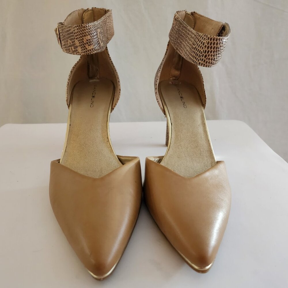 Leather and Snake Skin Pump. Ankle closure along with a Back Zipper.